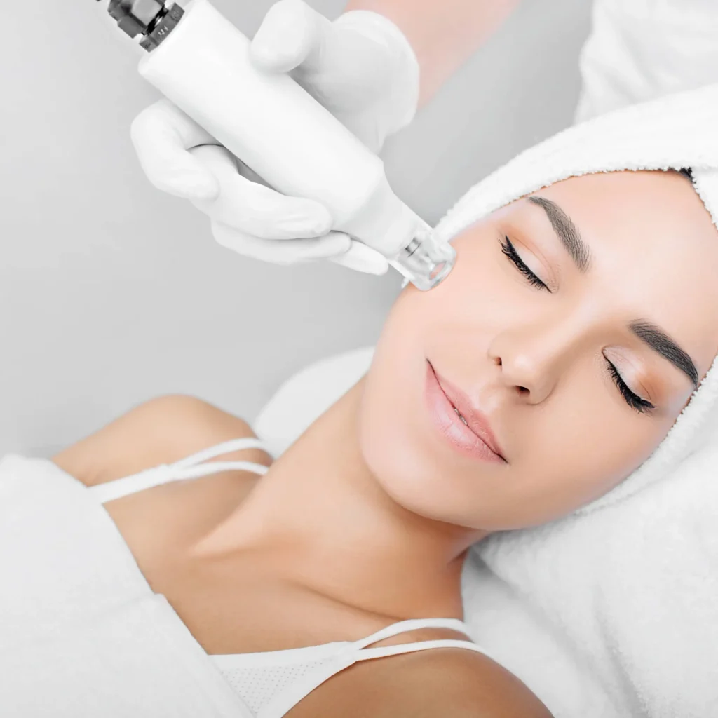 Patient receiving HydraFacial Keravive for scalp rejuvenation in Cranston, RI